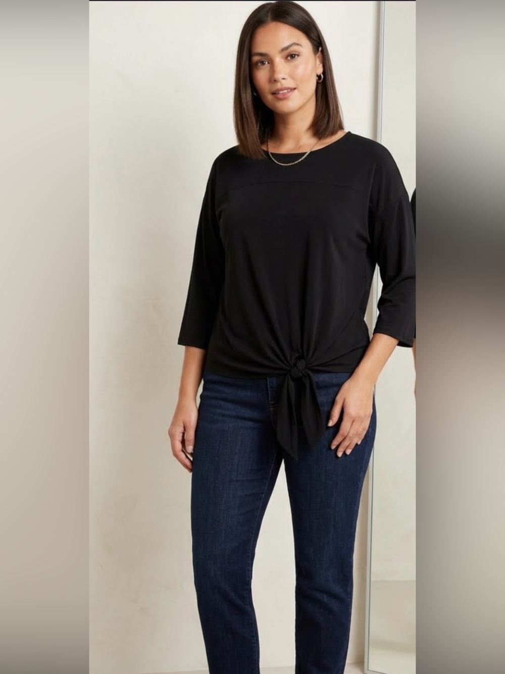 black Chico's slinky top features a chic tie-front size 3 (16 XL)